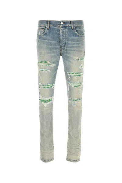 AMIRI AMIRI BOUCLE THRASHER DISTRESSED JEANS