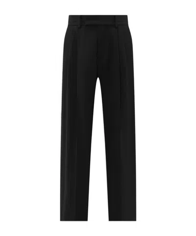 AMIRI AMIRI LOGO PATCH TAPERED LEG TROUSERS