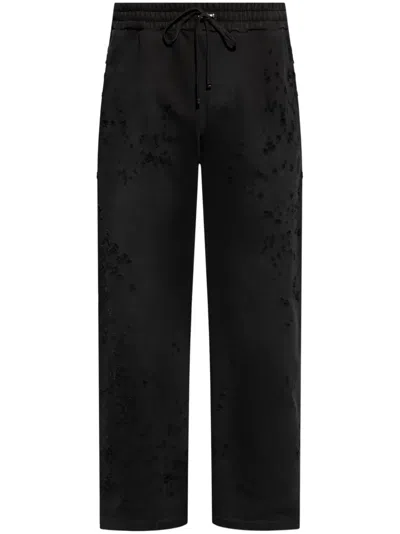 AMIRI DISTRESSED FINISH STRAIGHT-LEGGED JOGGING TROUSERS