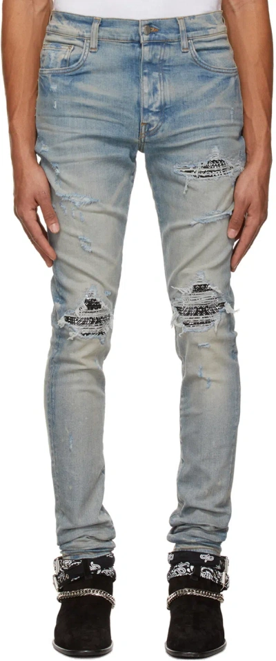 AMIRI MX1 RIPPED SKINNY JEANS