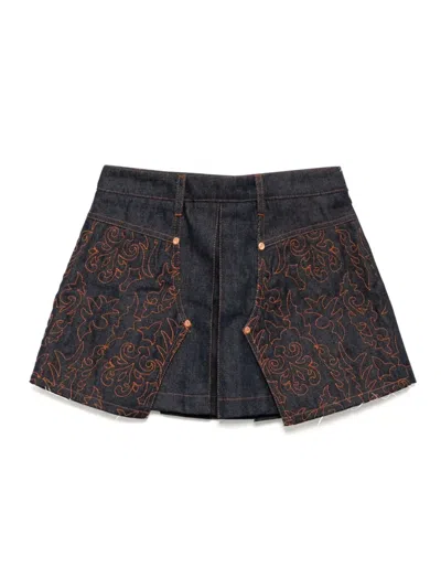 ANDERSSON BELL EMBROIDERED PANELLED PLEATED DENIM SKIRT