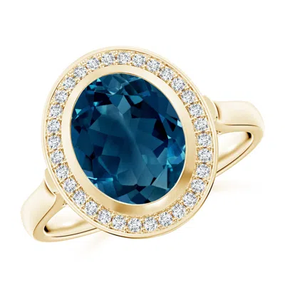 ANGARA BEZEL-SET OVAL LONDON BLUE TOPAZ RING WITH DIAMOND HALO