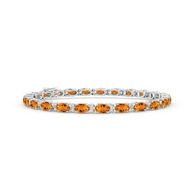 ANGARA CLASSIC OVAL CITRINE AND DIAMOND TENNIS BRACELET
