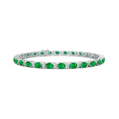ANGARA CLASSIC OVAL EMERALD AND DIAMOND TENNIS BRACELET