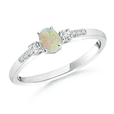 ANGARA CLASSIC OVAL OPAL AND ROUND DIAMOND THREE STONE RING