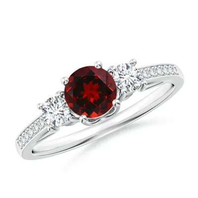 ANGARA CLASSIC PRONG SET ROUND GARNET AND DIAMOND THREE STONE RING