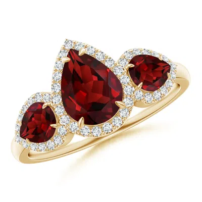 ANGARA CLAW-SET PEAR GARNET THREE STONE RING WITH DIAMOND HALO