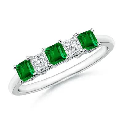 ANGARA DIAMOND CLUSTER AND THREE STONE SQUARE EMERALD RING