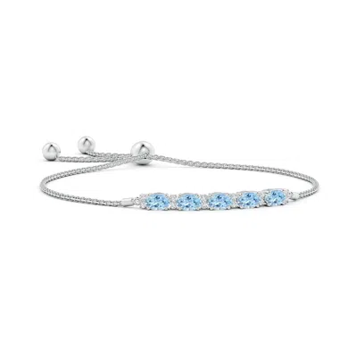 ANGARA EAST-WEST OVAL AQUAMARINE BOLO BRACELET WITH DIAMONDS