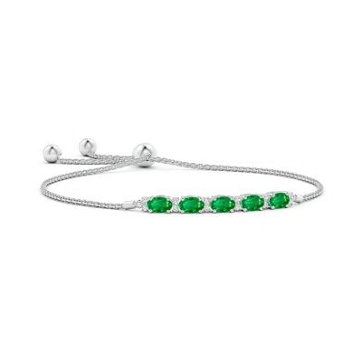 ANGARA EAST-WEST OVAL EMERALD BOLO BRACELET WITH DIAMONDS