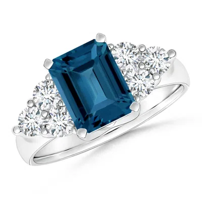 ANGARA EMERALD CUT LONDON BLUE TOPAZ RING WITH TRIO DIAMOND ACCENTS