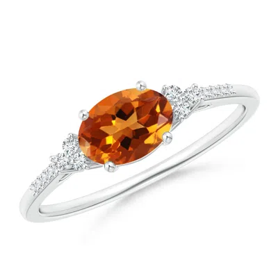 ANGARA HORIZONTALLY SET OVAL CITRINE RING WITH TRIO DIAMONDS