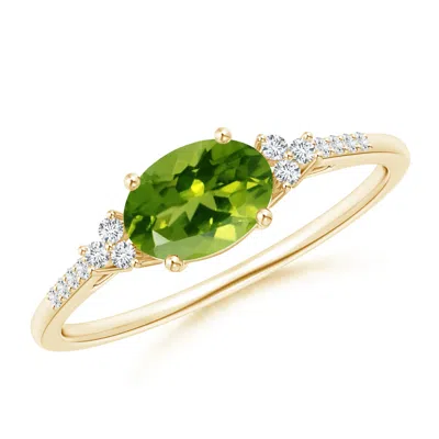ANGARA HORIZONTALLY SET OVAL PERIDOT SOLITAIRE RING WITH TRIO DIAMOND ACCENTS