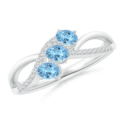 ANGARA OVAL AQUAMARINE THREE STONE BYPASS RING WITH DIAMONDS