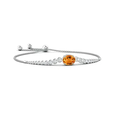 ANGARA OVAL CITRINE BOLO BRACELET WITH BEZEL DIAMONDS