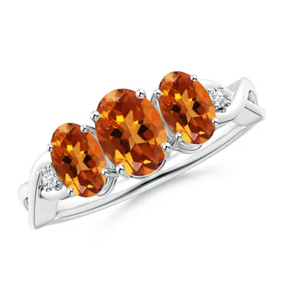 ANGARA OVAL CITRINE THREE STONE CRISS-CROSS RING