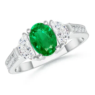 ANGARA OVAL EMERALD AND HALF MOON DIAMOND THREE STONE RING