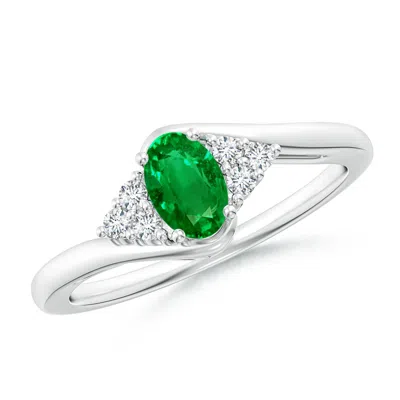 ANGARA OVAL EMERALD BYPASS RING WITH TRIO DIAMOND ACCENTS