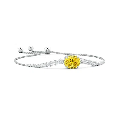 ANGARA OVAL FANCY INTENSE YELLOW DIAMOND BOLO BRACELET WITH BEZEL ACCENTS