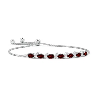 ANGARA OVAL GARNET BOLO BRACELET WITH PAVE-SET DIAMONDS
