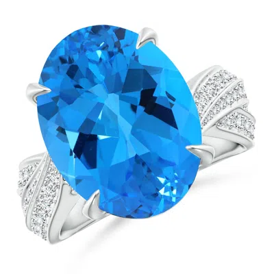 ANGARA OVAL GIA CERTIFIED SKY BLUE TOPAZ CROSSOVER SHANK RING