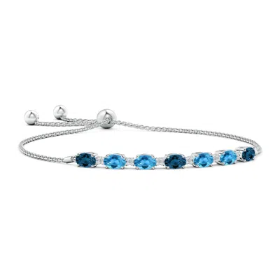 ANGARA OVAL LONDON AND SWISS BLUE TOPAZ BOLO BRACELET
