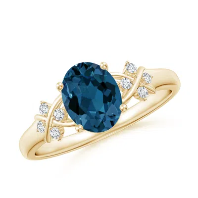 ANGARA OVAL LONDON BLUE TOPAZ CRISS CROSS RING WITH DIAMONDS