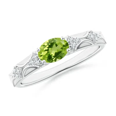 ANGARA OVAL PERIDOT VINTAGE STYLE RING WITH DIAMOND ACCENTS
