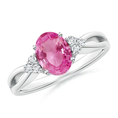ANGARA OVAL PINK SAPPHIRE SPLIT SHANK RING WITH TRIO DIAMONDS