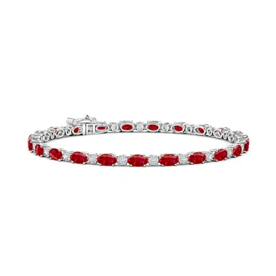 ANGARA OVAL RUBY TENNIS BRACELET WITH GYPSY DIAMONDS