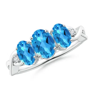 ANGARA OVAL SWISS BLUE TOPAZ THREE STONE CRISS-CROSS RING