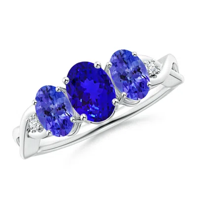 ANGARA OVAL TANZANITE THREE STONE CRISS-CROSS RING