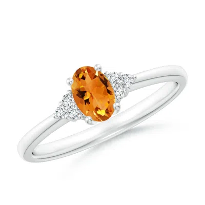 ANGARA SOLITAIRE OVAL CITRINE RING WITH TRIO DIAMOND ACCENTS