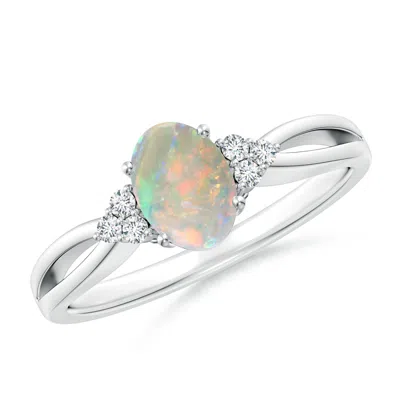 ANGARA SOLITAIRE OVAL OPAL SPLIT SHANK RING WITH TRIO DIAMONDS