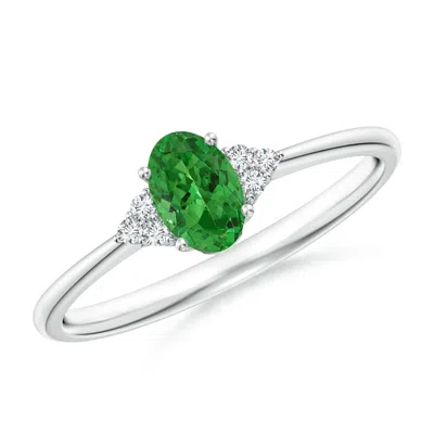 ANGARA TAPERED SHANK OVAL TSAVORITE RING WITH TRIO DIAMOND ACCENT