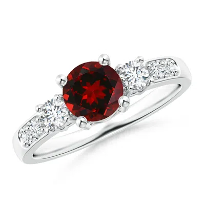 ANGARA THREE STONE GARNET AND DIAMOND RING