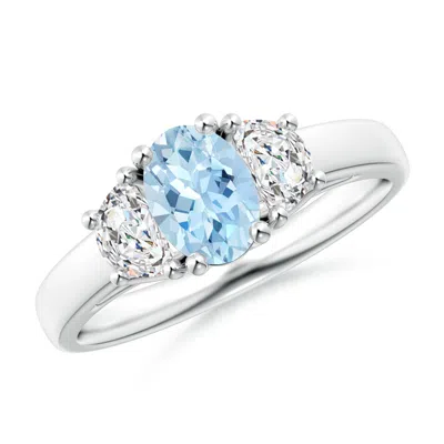 ANGARA THREE STONE OVAL AQUAMARINE AND HALF MOON DIAMOND RING