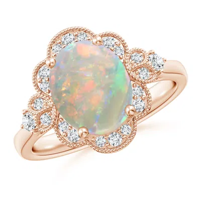 ANGARA VICTORIAN STYLE OVAL OPAL AND DIAMOND HALO ENGAGEMENT RING