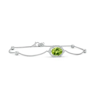 ANGARA VINTAGE STYLE OVAL PERIDOT AND DIAMOND LEO STATION BRACELET