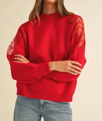ANNIEWEAR EMBROIDERED SHOULDER MOCK NECK SWEATER