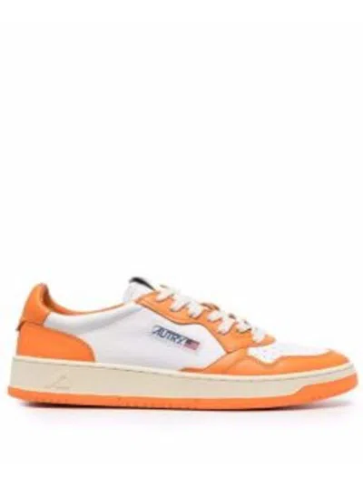 AUTRY WHITE AND ORANGE LEATHER SNEAKERS WITH LOGO