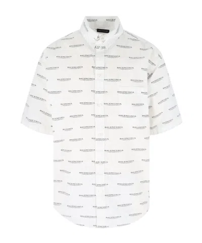 BALENCIAGA BALENCIAGA ALLOVER LOGO PRINTED SHORT-SLEEVED SHIRT