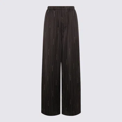 BALENCIAGA BLACK AND BROWN PANTS