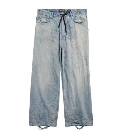 BALENCIAGA DISTRESSED DRAWSTRING WIDE-LEG JEANS