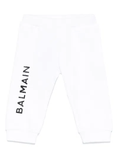 BALMAIN LOGO-STAMP TRACK PANTS