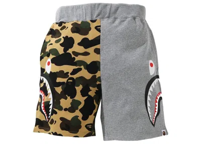 BAPE MEN'S BAPE 1ST CAMO HALF SIDE SHARK SWEAT SHORTS IN YELLOW