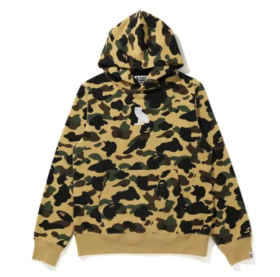 BAPE MEN'S BAPE X OVO 1ST CAMO PULLOVER HOODIE IN YELLOW