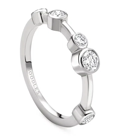 BOODLES PLATINUM AND DIAMOND HALF-HOOP RING