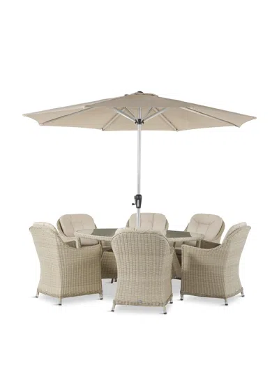 BRAMBLECREST MONTEREY RATTAN 6 SEAT ELLIPTICAL DINING SET WITH PARASOL & BASE
