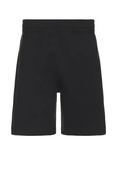 BURBERRY SHORTS WITH CHECK LABEL